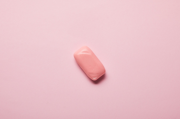 top view of pink soap on pastel background with copy space  - Photo, Image