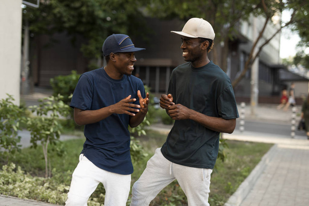 African american men friends speaking together - Фото, изображение