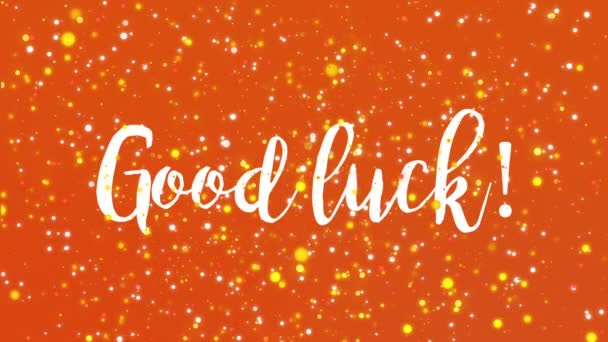 Sparkling orange Good luck animated greeting card with handwritten text. - Footage, Video