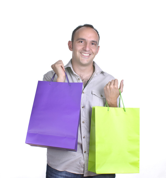 Homme souriant avec des sacs à provisions
 - Photo, image