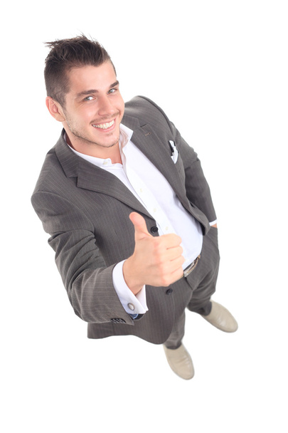Happy smiling young business man with thumbs up gesture - Photo, Image