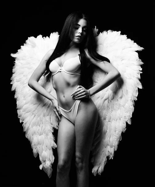 sensual woman with sexy body. love games on valentines day. fashion beauty. girl in agnel wings. sexy cupid. fitness body. female underwear. sexy woman in erotic lingerie. Waiting for him - Fotó, kép