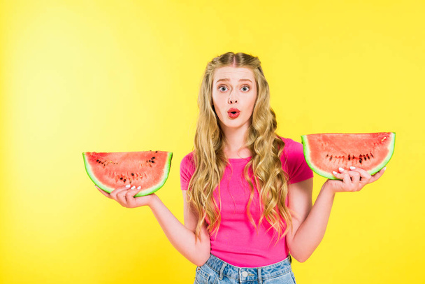 beautiful surprised girl with watermelon slices On yellow - Zdjęcie, obraz