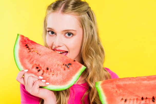beautiful girl eating watermelon Isolated On yellow - Foto, imagen