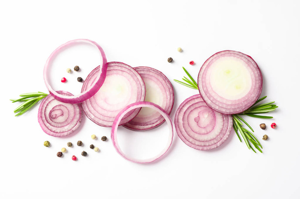 Flat lay composition with red onion rings and spices on white ba - Photo, Image