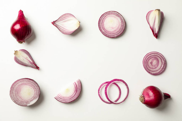 Flat lay composition with red onion on white background - Fotoğraf, Görsel