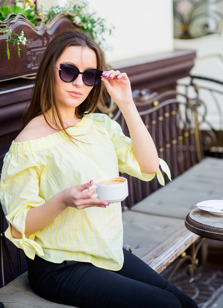 summer fashion. Starting day with good news. Meeting in cafe. good morning. Breakfast time. girl relax in cafe. Business lunch. stylish woman in glasses drink coffee. morning coffee. Waiting for date - Photo, image