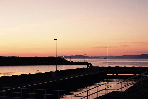 Sunset over a port - Photo, Image
