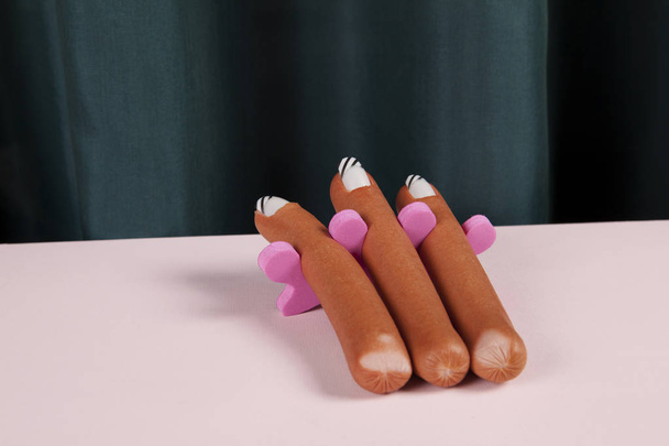 curtain and sausage manicure - Foto, imagen