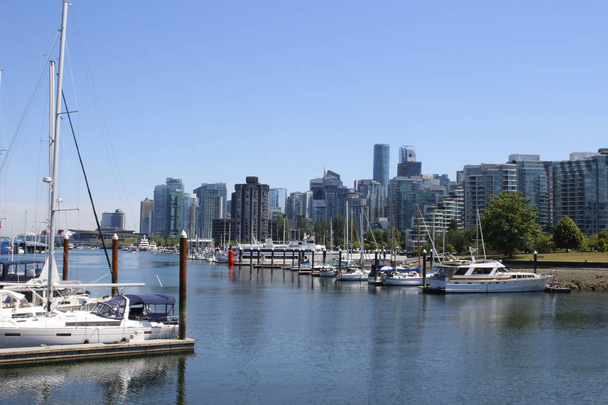 June 18 2018, Vancouver Canada: Editorial image of False creek boat harbour. This is a very rich area of Vancouver - Φωτογραφία, εικόνα