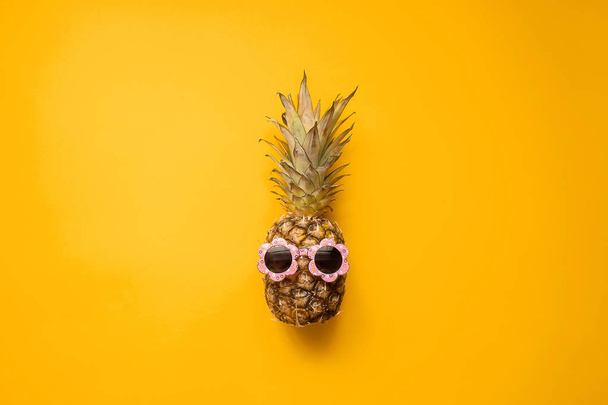 Fashion Hipster Pineapple in Sunglasses. Bright Summer Color. Tropical Fruit. Creative Art concept. Minimal style Hot Beach Party  - Zdjęcie, obraz