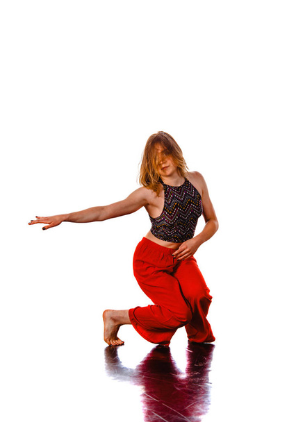 Teenage girl dancing breakdance in action - Foto, imagen