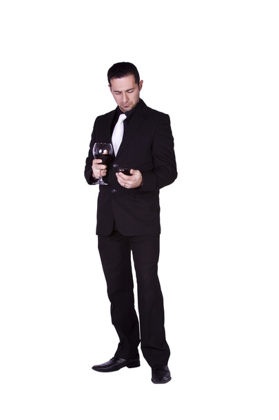 Businessman with a glass of drink - Zdjęcie, obraz