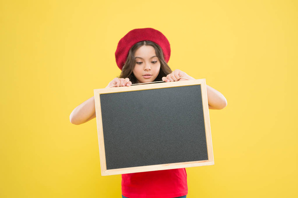 Girl hold blank blackboard chalkboard. Advertising copy space. Back to school concept. Happy hours. Good news. School information. Informing you. Child promo information board. Place for information - Photo, image