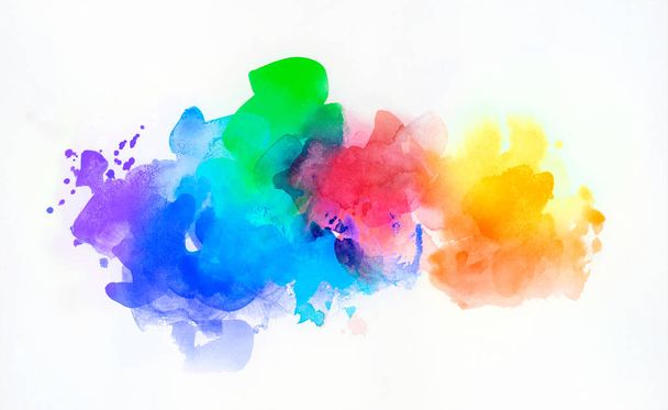 rainbow colored watercolor paints and textures on white paper - Fotó, kép