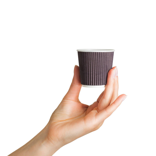 Woman hand holding coffee paper drinking cup - Photo, Image