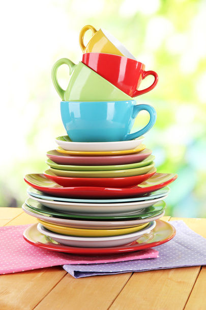 Mountain colorful dishes on napkin on nature background - Φωτογραφία, εικόνα
