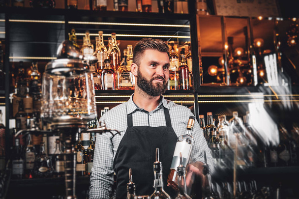 Handsome barman is posing for photographer - Foto, afbeelding