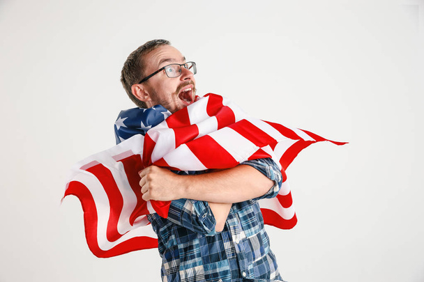 Young man with the flag of United States of America - Fotoğraf, Görsel