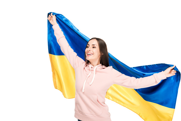 feliz joven sosteniendo bandera de Ucrania aislado en blanco
 - Foto, Imagen