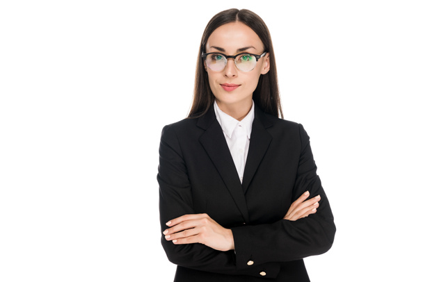 confident businesswoman in black suit with crossed arms isolated on white - Φωτογραφία, εικόνα