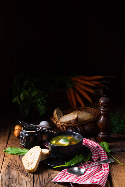 Rustikal Sorrel soup with potatoes and cream - Fotó, kép