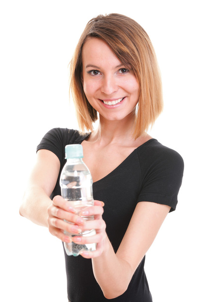 Beautiful girl drinking water from blue bottle isolated - Photo, image
