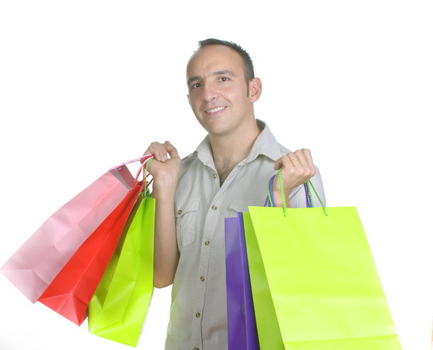 çeşitli alışveriş torbaları ile gülümseyen adam - Fotoğraf, Görsel