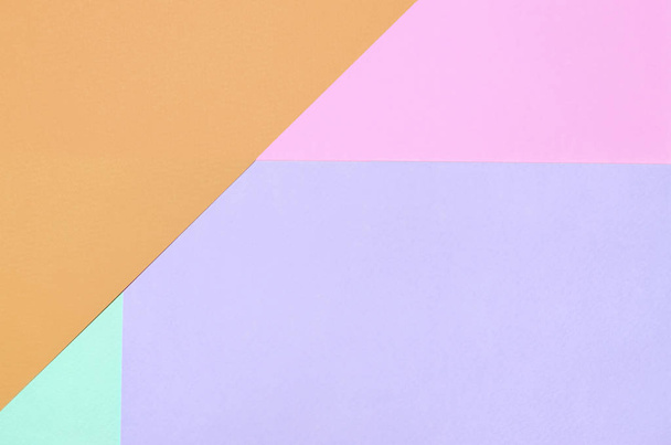 Texture background of fashion pastel colors. Pink, violet, orange and blue geometric pattern papers. - Фото, изображение