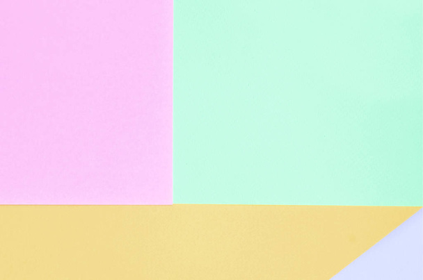 Текстура фону модних пастельних кольорів. Рожеві, фіолетові, помаранчеві та сині геометричні папери
. - Фото, зображення