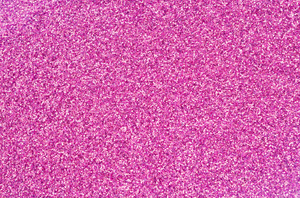 Lentejuelas decorativas rosas. Imagen de fondo con luces bokeh brillantes de pequeños elementos
 - Foto, imagen