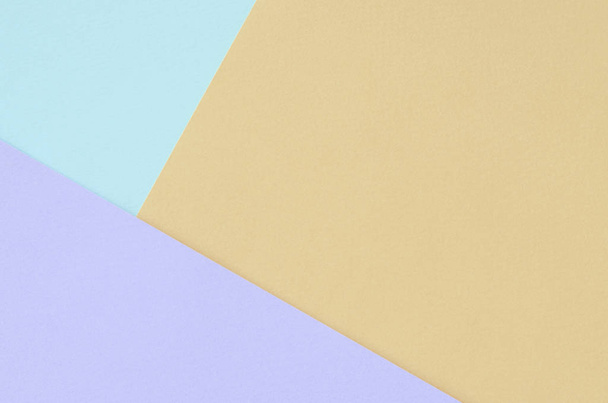 Texture background of fashion pastel colors. Violet, orange, and blue geometric pattern papers. - Photo, Image