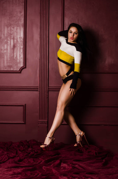 Young beautiful woman in a fashionable linen luxury brunette in the Studio - Zdjęcie, obraz