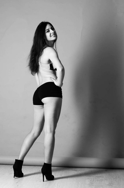 Beautiful young slender girl (woman) with long hair, wearing a w - Foto, Imagem