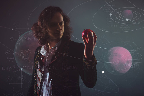 History of science, concept. Isaac Newton with Apple in hand - Fotó, kép