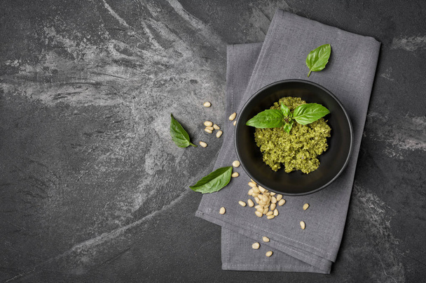 Pesto sause with basil leaves and pine nuts - Foto, Imagen