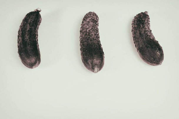 Beautiful, juicy organic cucumbers on a white background - Valokuva, kuva