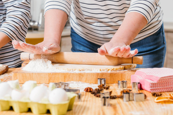 homemade pastry woman rolling dough flour - Fotó, kép