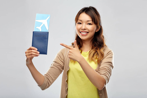 african woman with passport and air ticket - Photo, image