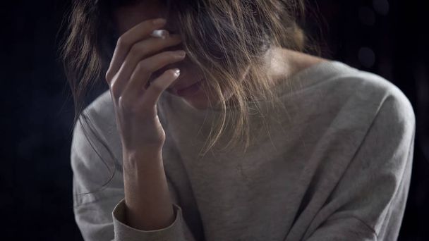 Depressed female smoking cigarette, thinking about life problems, addiction - Valokuva, kuva