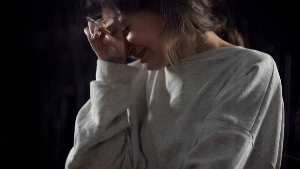 Crying woman smoking cigarette, suffering depression, hopelessness closeup - Photo, image