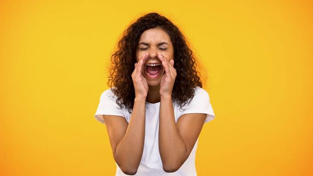 African-american female shouting on camera, trying to pay attention, opinion - 写真・画像