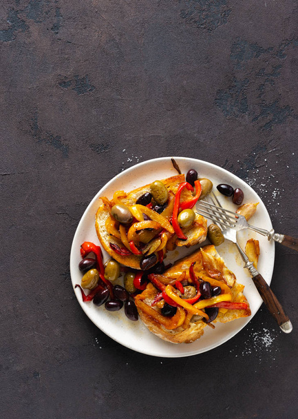 Sandwiches with smoke peppers, olives and garlic on a light background, top view. Flat lay - Foto, Imagem