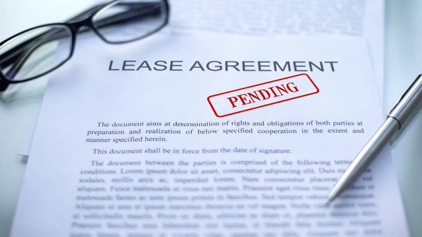 Lease agreement pending, seal stamped on official document, business contract - Фото, изображение