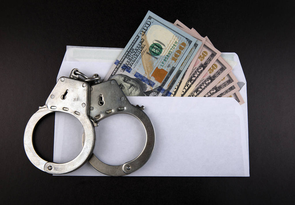 Handcuffs with a Money - Foto, Bild