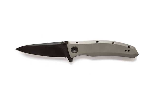 Black knife blade and gray handle. Aluminum knife handle. - Photo, Image