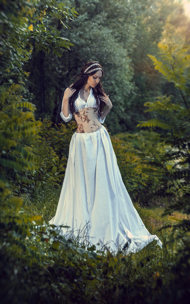 Outdoor shot of beautiful woman in forest - Foto, immagini
