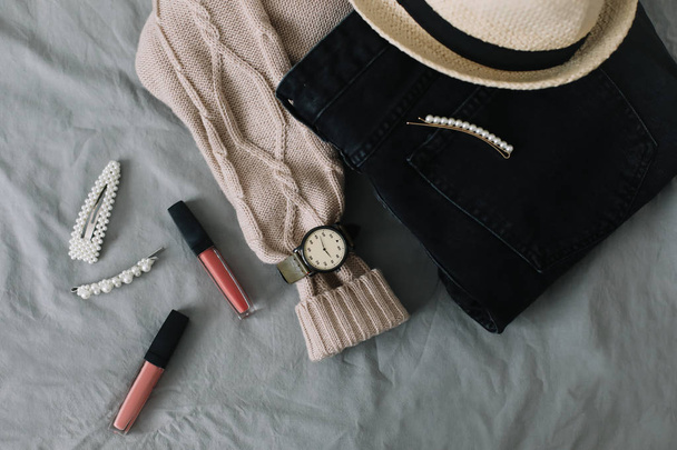 Stylish flatlay arrangement with female fashion clothes and accessories. Stylish feminine outfit concept. Beauty and fashion blog. - Foto, imagen
