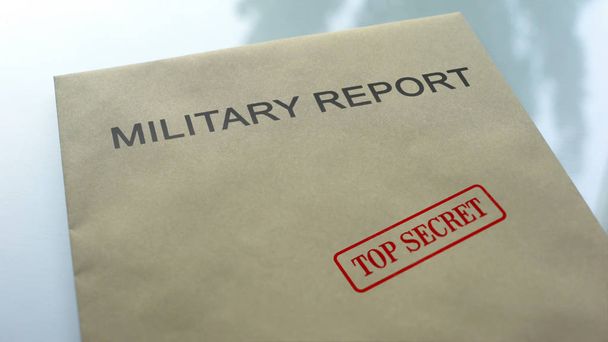 Military report top secret, seal stamped on folder with important documents - Photo, Image