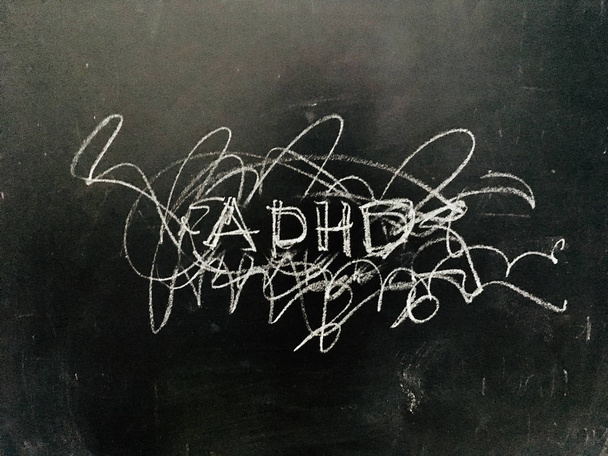 ADHD handwritten on Blackboard  - Фото, изображение